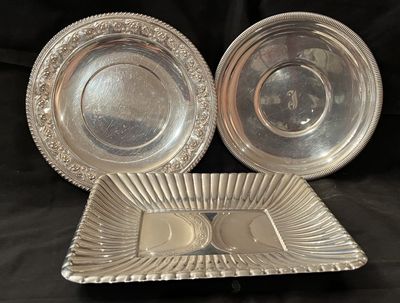 Two sterling silver plates and a fluted rectangular tray